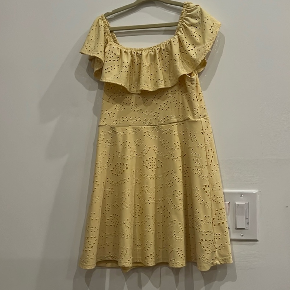 Pretty eyelet yellow dress. worn and loved but in perfect condition.